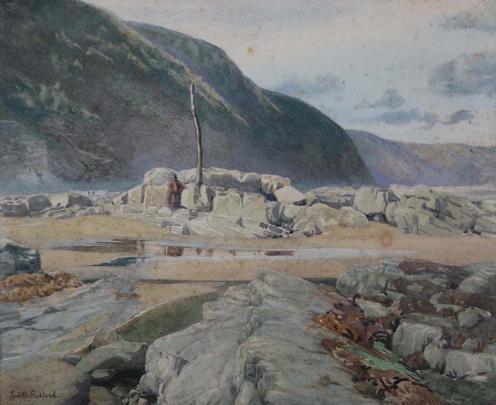 Watercolour of rocks and sand with cliffs in the background